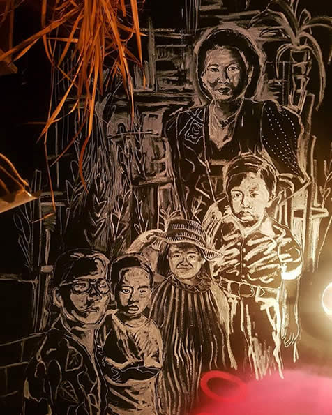 Muurschildering in Koco Bistro, verwijzing naar Jakarta